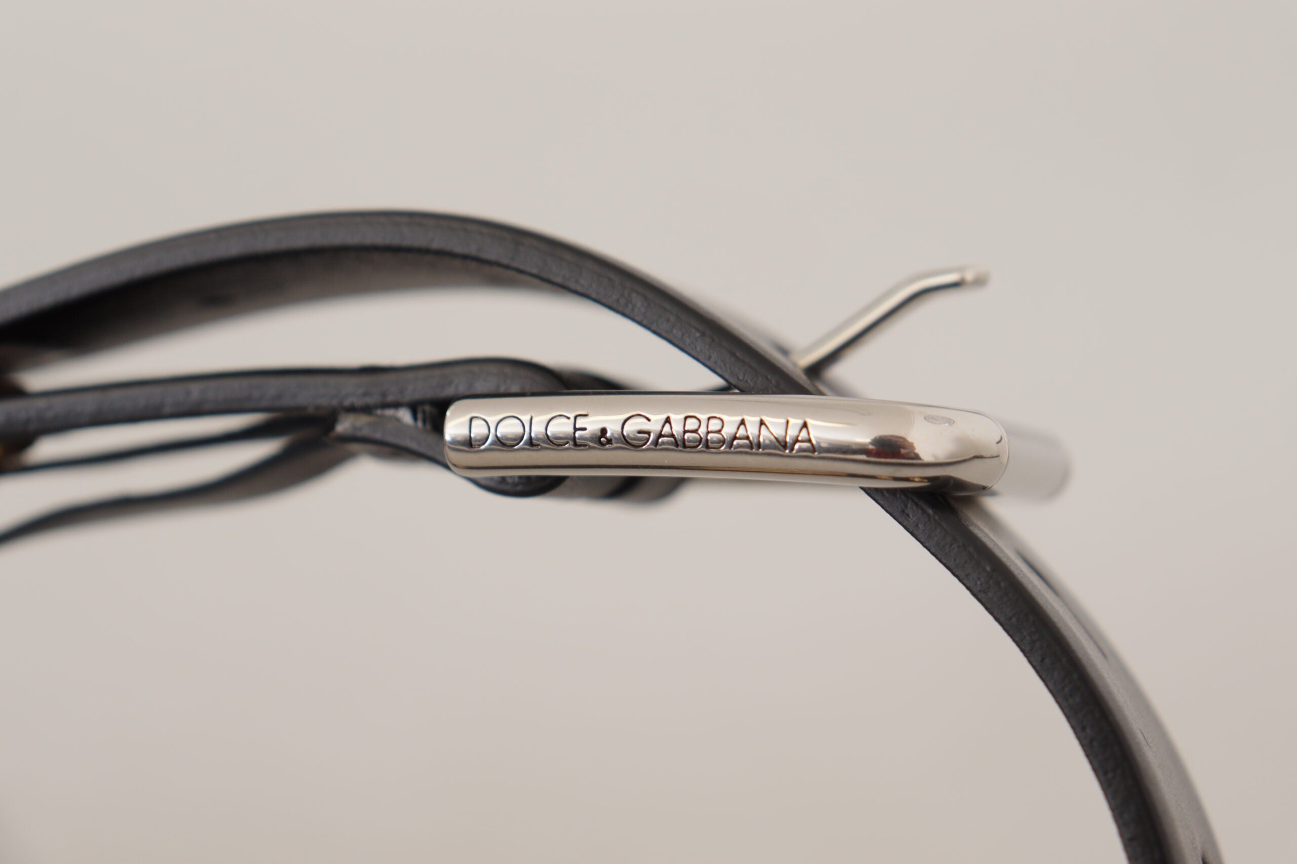 Dolce & Gabbana Chic Black Leather Belt with Engraved Buckle